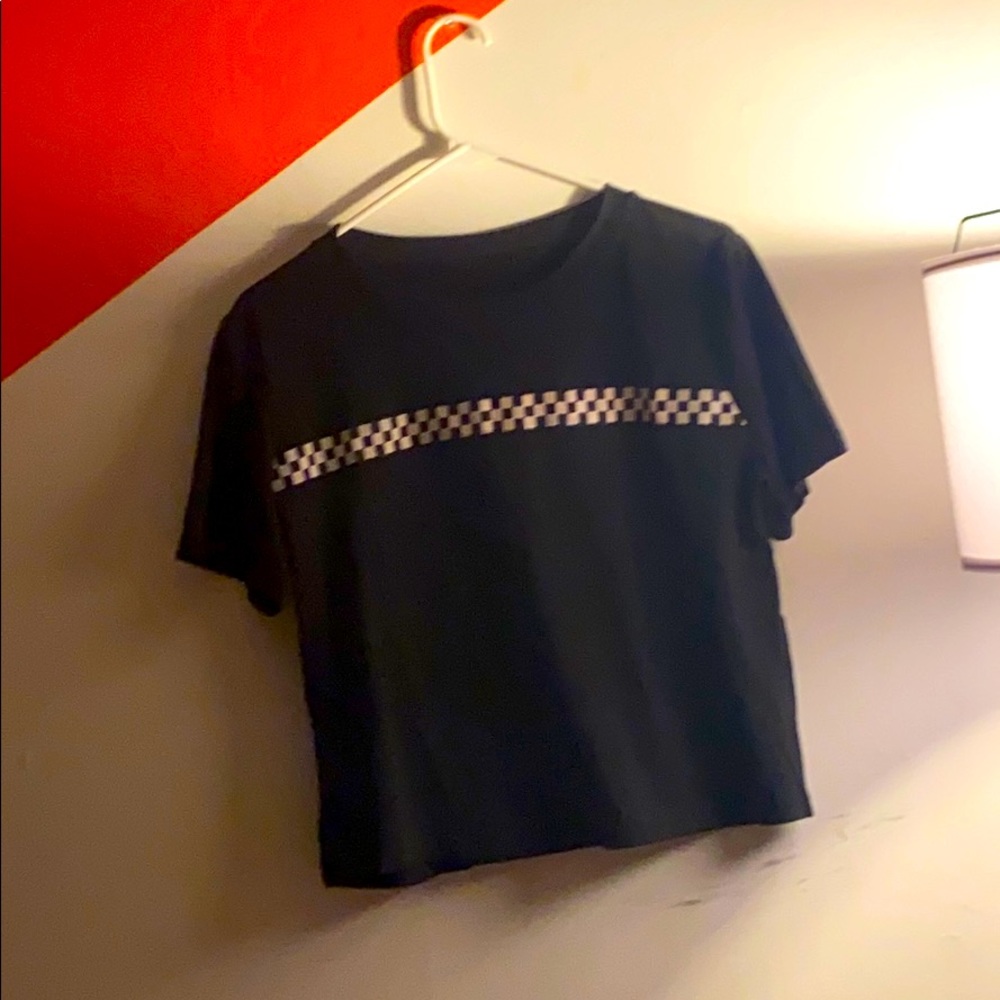 black crop top with checkered pattern on front